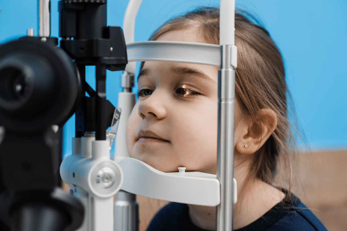 little girl getting an eye exam